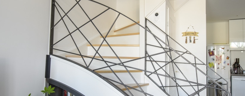 escalier double quart tournant avec limon et rampe en acier