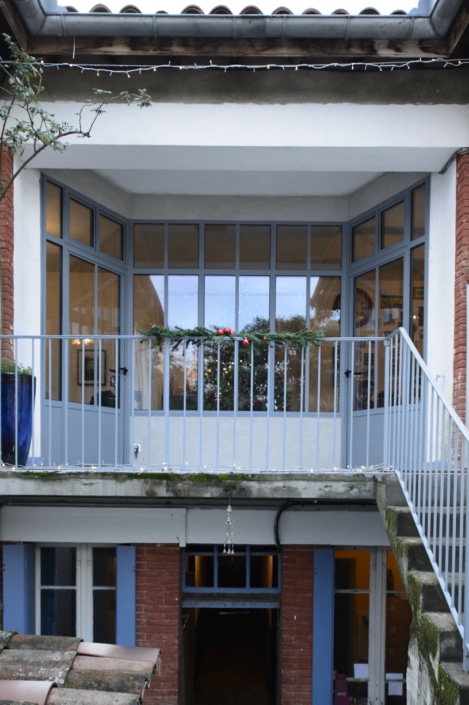 verrière d'extérieur haut de gamme maison et portes en fer forgé