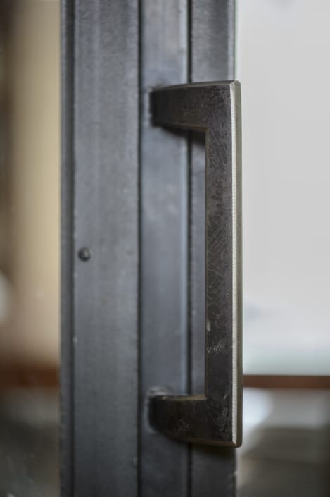 poignet de porte verrière en métal et acier